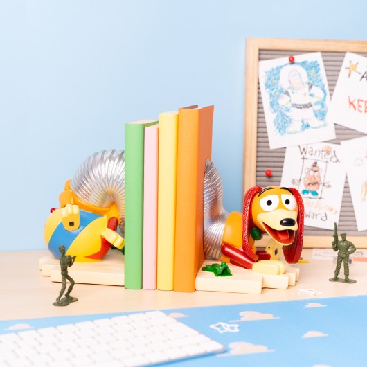 SUJETALIBROS DISNEY PIXAR TOY STORY SLINKY