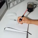 CADERNO PREMIUM A5 COM ESFEROGRÁFICA SABRE DE LUZ STAR WARS DARTH VADER